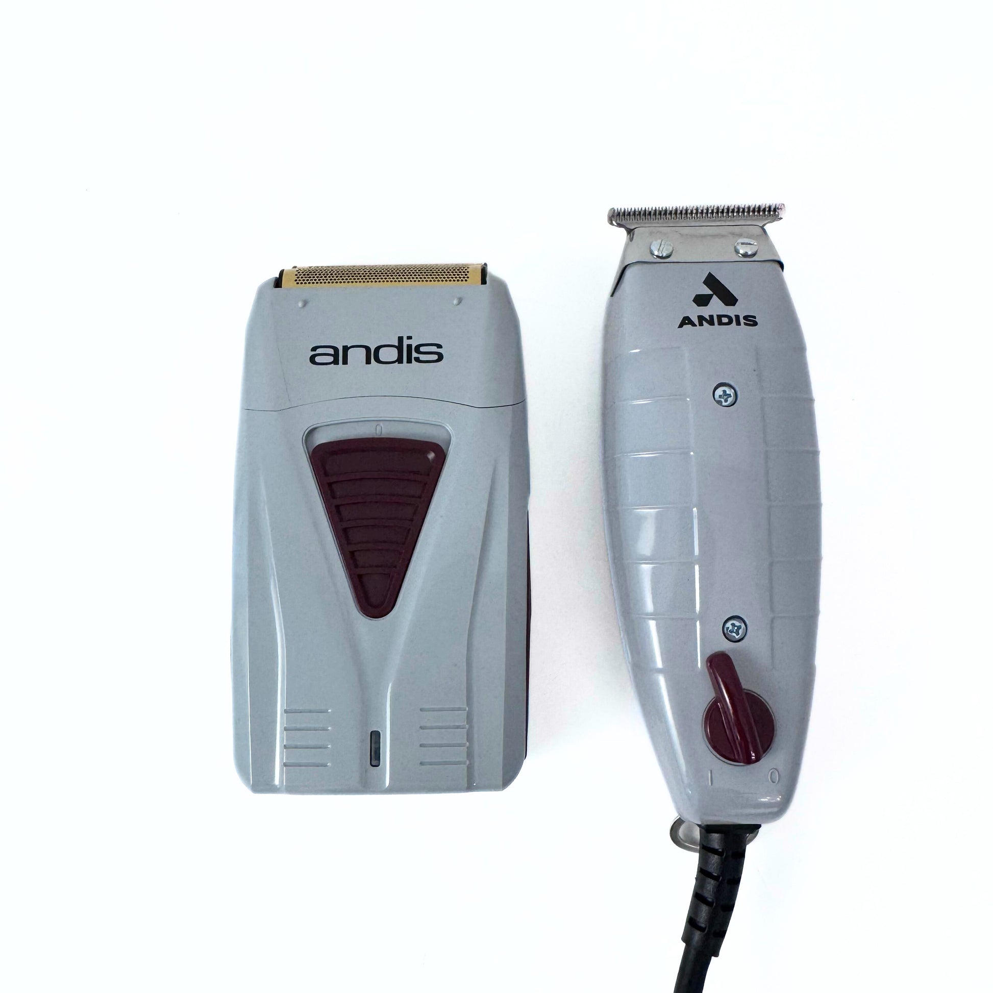 Andis  Finishing Combo T-Outliner Trimmer and Pro Foil Shaver 17195 next to each other