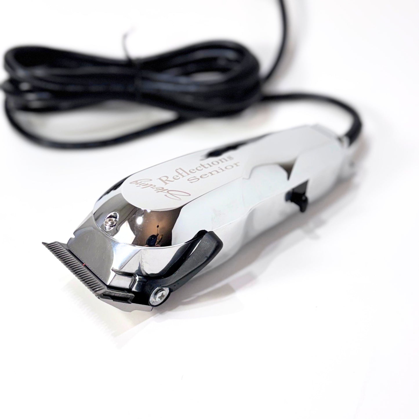 Wahl Reflections senior clipper laying flat left angle