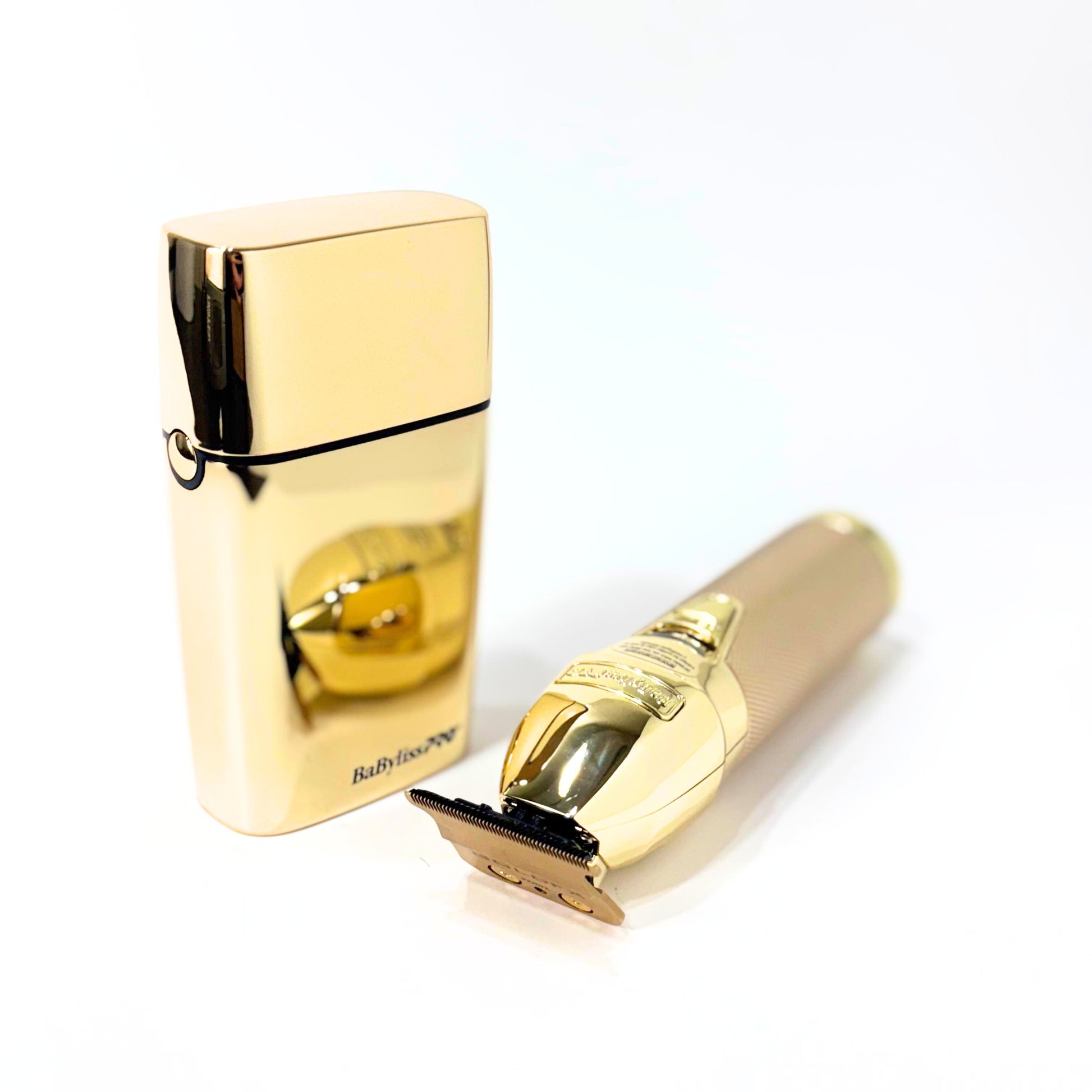 babylisspro goldfx trimmer and shaver combo trimmer laying next to shaver