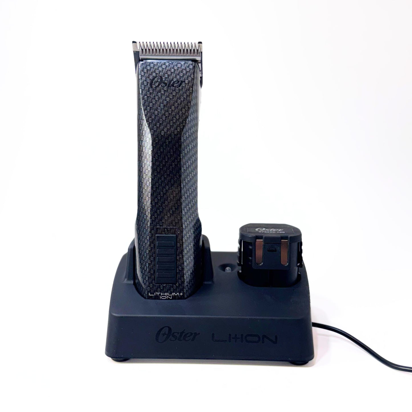 oster octane clipper on charging stand with battery